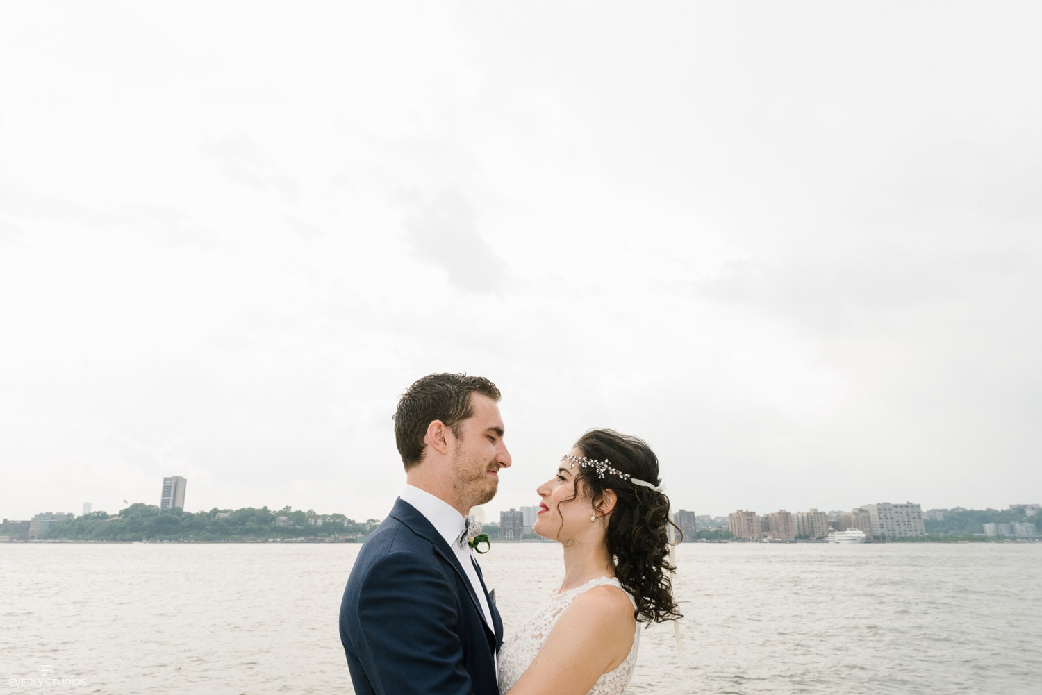 Bride and groom at Chelsea Piers Sunset Terrace wedding on the Hudson River in NYC