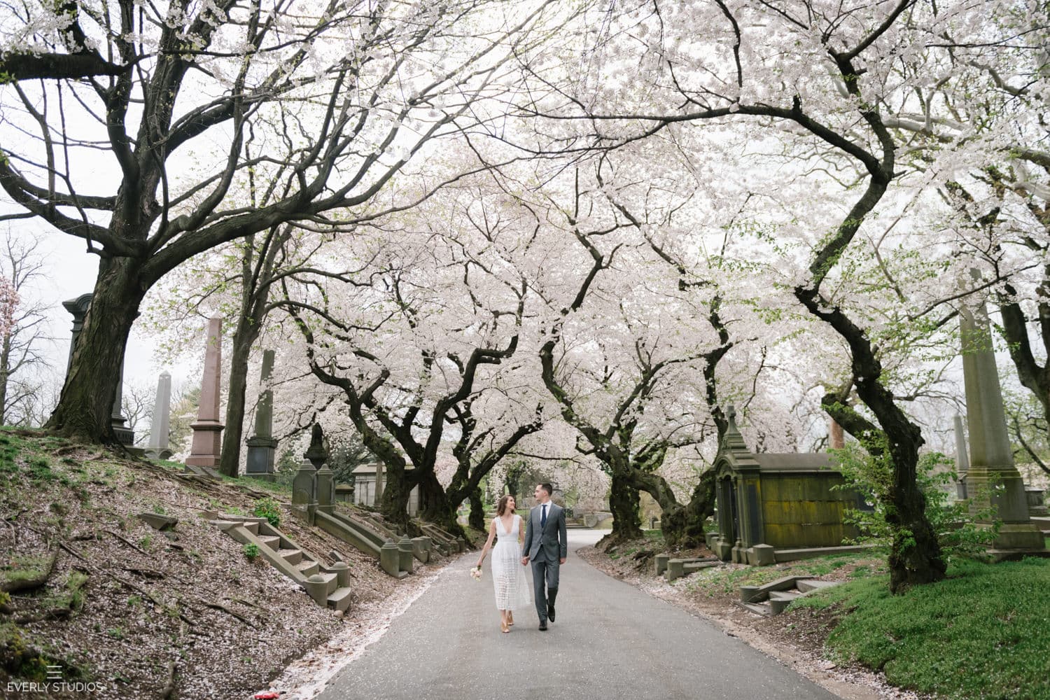Greewood Cemetery wedding portraits in Brooklyn, New York, during cherry blossom season. Photos by Brooklyn wedding photographer Everly Studios, www.everlystudios.com